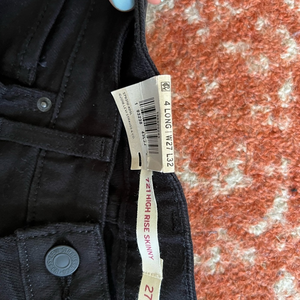 Levi’s Black Denim Ripped Knee Jeans